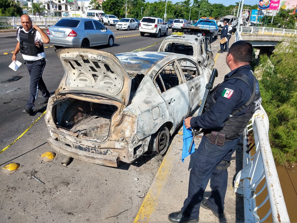 Un incendio en una planta de gas LP y enfrentamientos en Culiacán, en Sinaloa, cimbraron este fin de semana a la población del territorio en disputa del crimen organizado tras la reciente captura de 2 capos en Texas. (Fotografía de archivo de Juan Carlos Cruz de la agencia EFE)