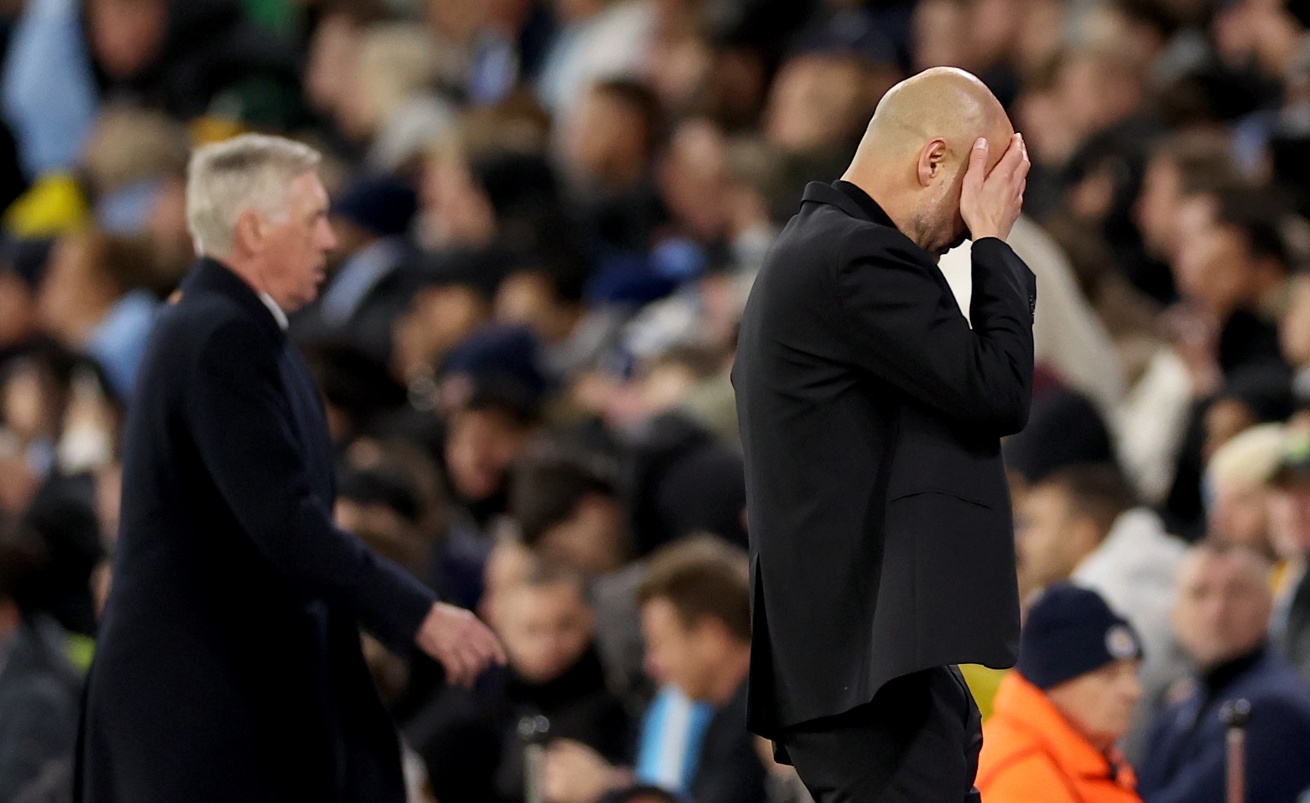 El entrenador del Real Madrid Carlo Ancelotti (I) y el del Manchester City Pep Guardiola durante el último partido que jugaron City y Madrid en la UEFA Champions League. (Foto de Adam Vaughan de la agencia EFE/EPA)
