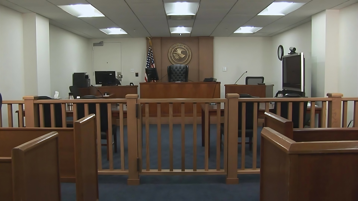 Fotografía cedida de una sala vacía de un tribunal de inmigración estadounidense. (Foto de EOIR de la agencia EFE)